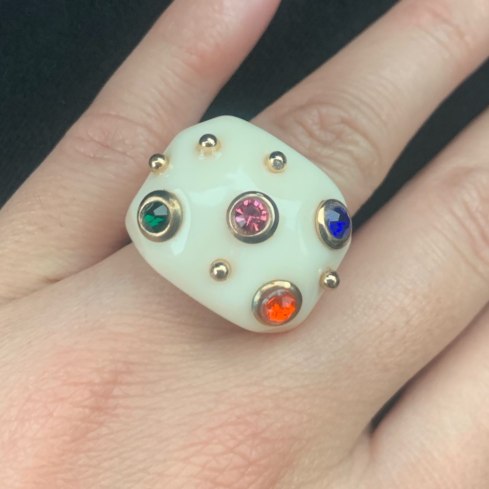 Colored resin ring with golden touch.  Size between 6-7.